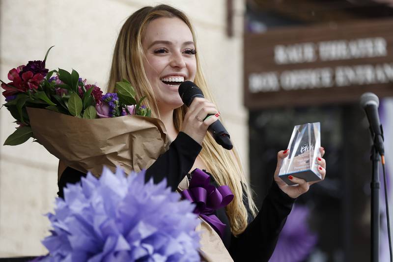 Grace Kinstler, a Crystal Lake Central High School graduate and finalist on "American Idol," is presented with the Raue Center's Sage 2021 Award on Tuesday, May 18, 2021, in Crystal Lake.