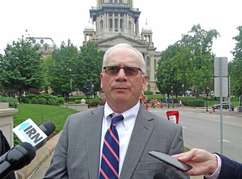 Attorney Jerry Stocks, who represents the plaintiffs in a lawsuit challenging the state's assault weapons ban, is pictured outside the Illinois Supreme Court building Tuesday after the court heard oral arguments in the case