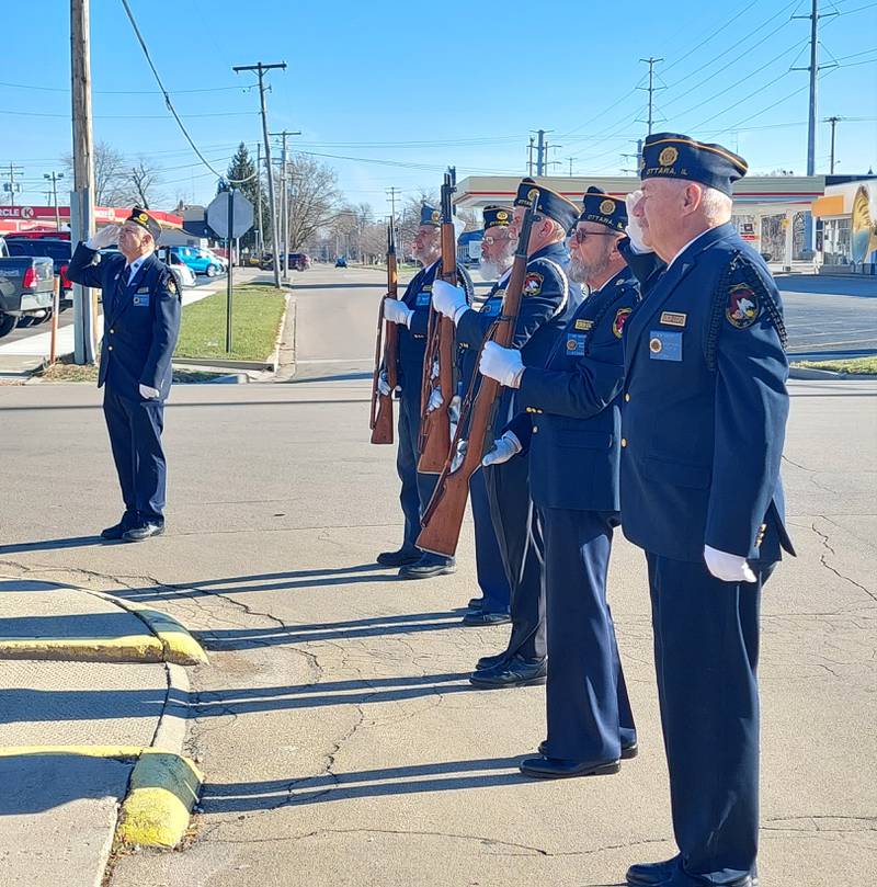 The Ottawa American Legion Honor Guard salutes the American flag as its raised on the flag pole Thursday, Dec. 7, 2023, during the Pearl Harbor memorial ceremony at the Ottawa VFW.