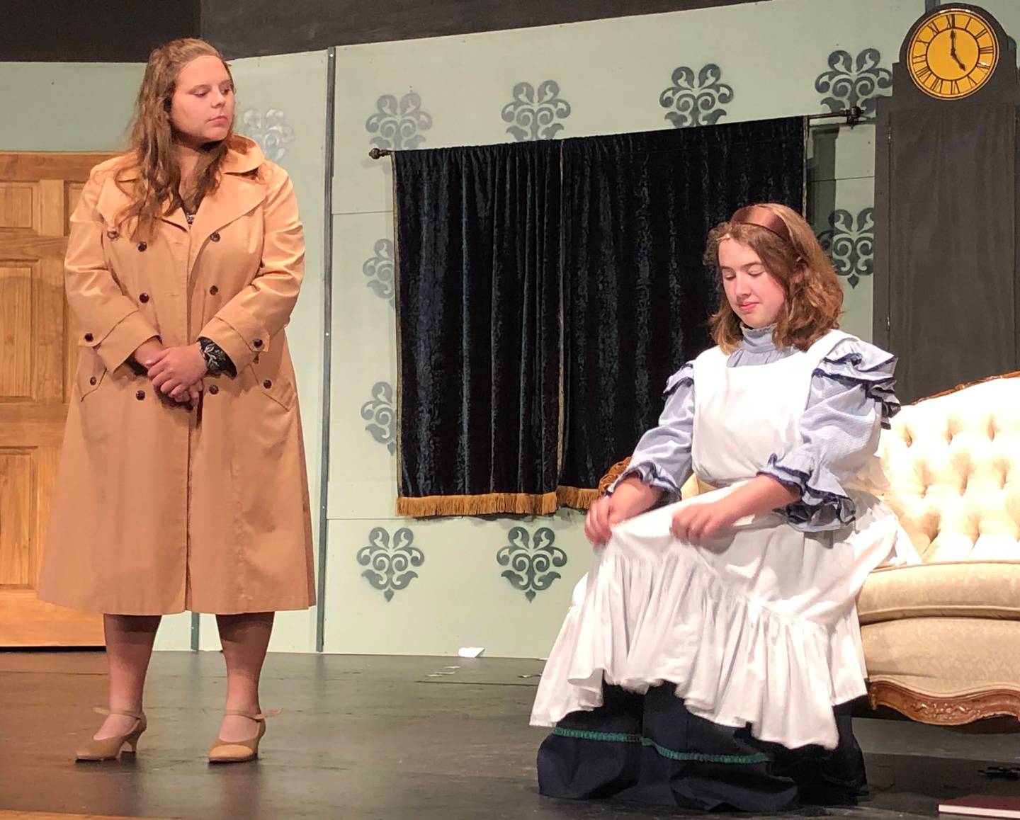 Senior Karli Miars (left) rehearses her lines in "The Play that Goes Wrong" with sophomore Jillian Younger (right) on Tuesday, Oct. 11, 2022