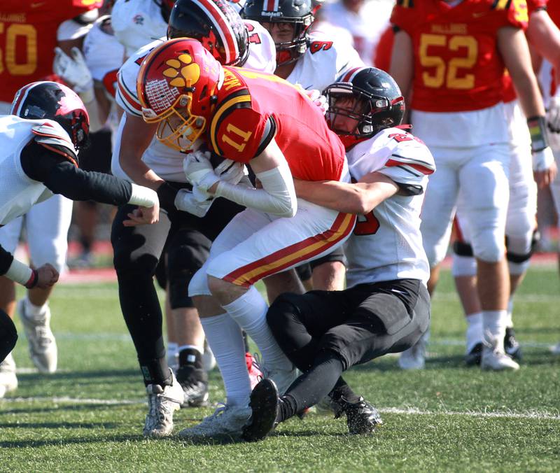 Batavia’s Patrick McNamara is taken down by Lincoln-Way Central’s Ryan Mackowiak during the Class 7A second round playoff game against Lincoln-Way Central in Batavia on Saturday, Nov. 4, 2023.