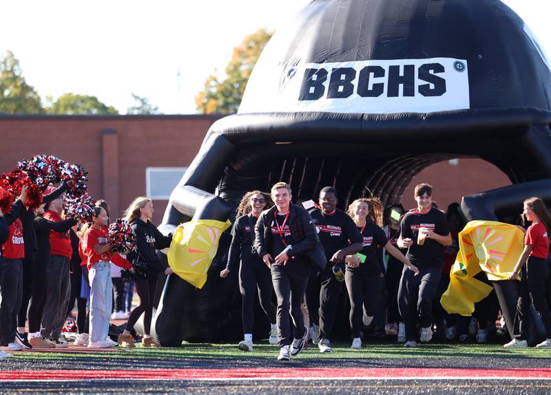 Bradley-Bourbonnais student Blake Dunham leads the Boilermakers out of the tunnel to kick off the annual Boilermaker Games, hosted by the Best Buddies club on Wednesday, Oct. 8, 2025, at Bradley-Bourbonnais Community High School.