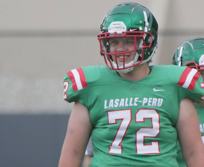 L-P's Nikolas Belski smiles as he is introduced during the Meet the Cavs football scrimmage on Friday, Aug. 19, 2022 at Howard Fellows Stadium in Peru.