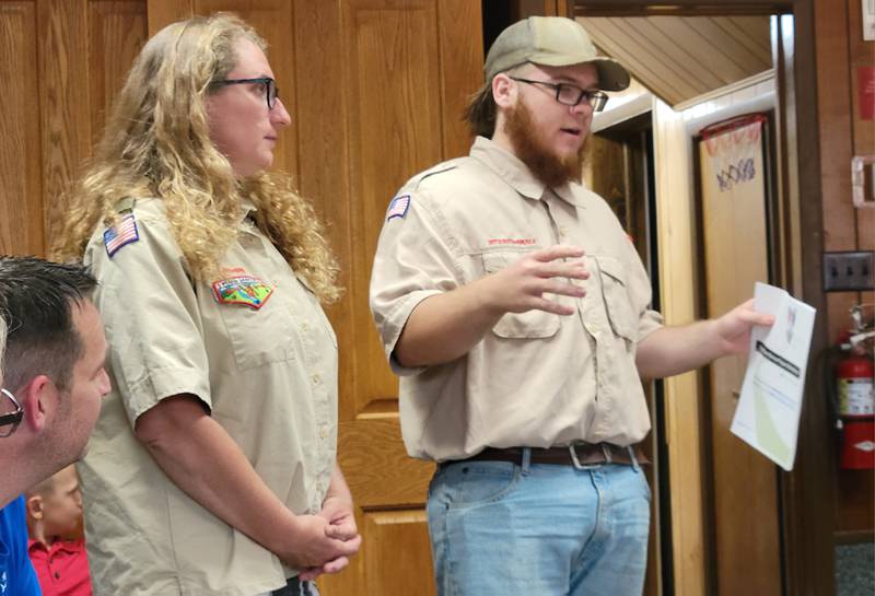 Marseilles Eagle Scout William Workman (right) describes for the Marseilles City Council his project, the building of a GaGa Ball court, as Scout leader Catherine Scheib looks on.