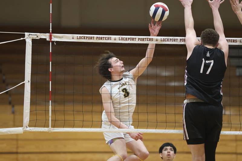 Joliet West’s Mason Lipuma hits a shot against Lockport on Tuesday, March 31, 2026 in Joliet.