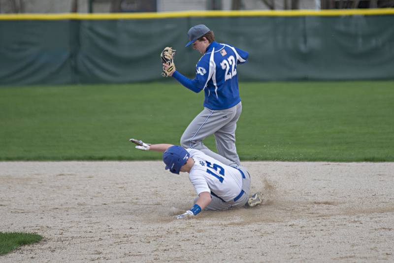 Princeton’s Jordan Reinhardt tags the bag for a force out of Newman’s Jaesen Johns Monday, May 2, 2022.