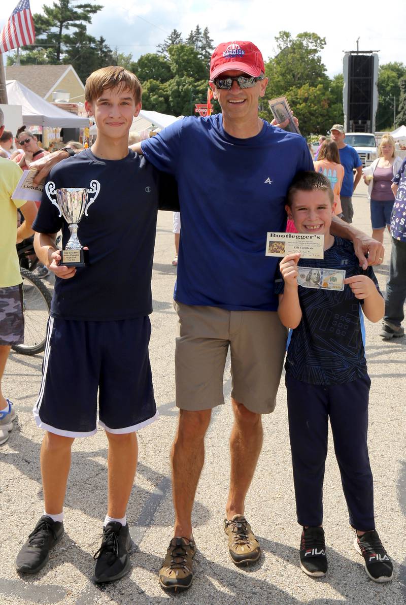 First Place Winners of the Toilet Bowl Races at the Maple Park Fun Fest, Sam Nickels, Steve Gramley and William Ghettle pose for a photo on Saturday, Sep. 3, 2022.