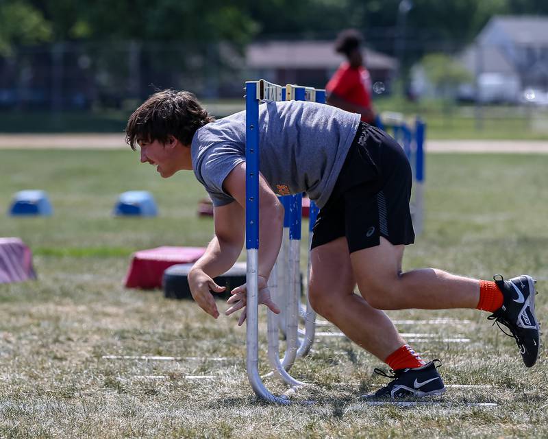 Plainfield East participates in agility drills at the West Aurora High School Battle of the Big Butts Linemen Challenge.  July 14, 2022.