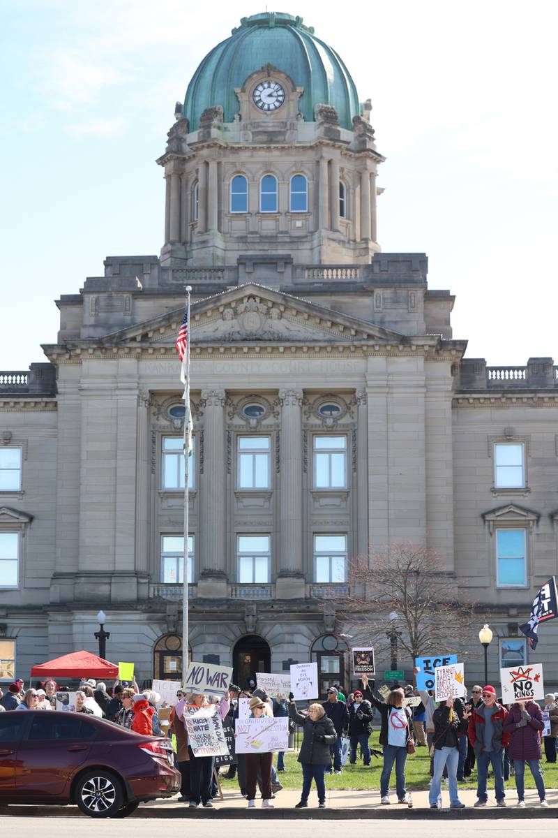 Protesters participate in the No Kings rally at the Kankakee County Courthouse on March 28, 2026.