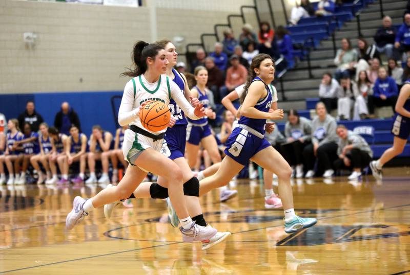 York’s Anna Filosa dribbles down court during a 4A Geneva Regional semifinal game against Geneva on Tuesday, Feb. 18, 2025 in Geneva.