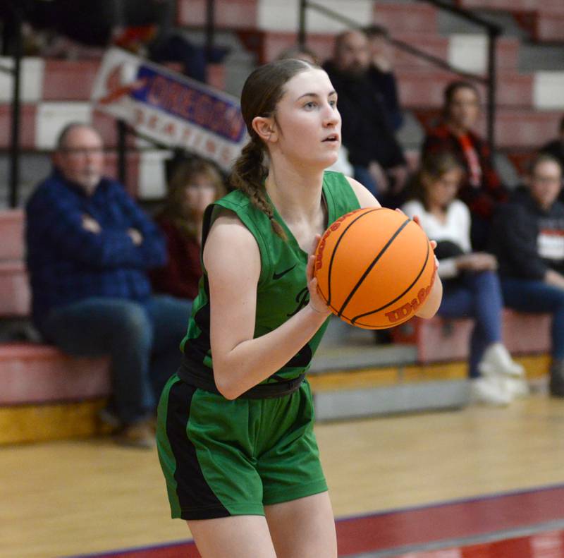 Rock Falls' Miley Bickett (0) prepares to shoot against Oregon during 2A regional action on Saturday, Feb. 15, 2025 at Oregon High School.