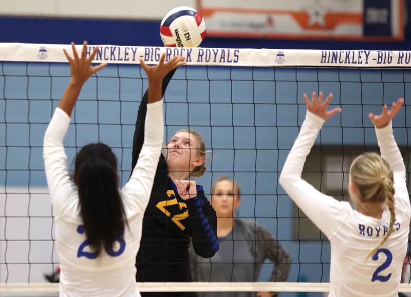 Somonauk's Morgan Potter tries to get the ball over Hinckley-Big Rock's Janelle Mahaffey during their match Thursday, Sept. 15, 2022, at Hinckley-Big Rock High School.