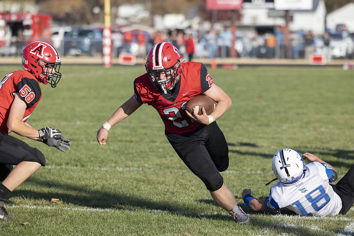 Amboy’s Quinn Leffelman picks up yards in the second quarter of the Clippers’ first round playoff game Saturday, Oct. 29, 2022 against Blue Ridge.