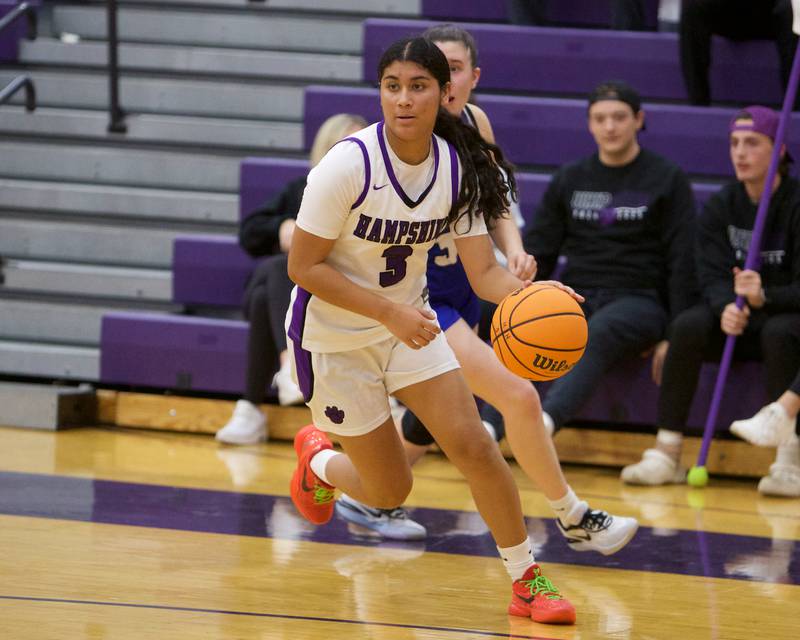 Hampshire's Jiselle Lopez drives the baseline against Geneva on Friday, Nov.22.2024 in Hampshire.