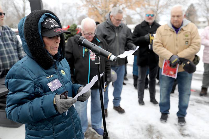 Sharon Nye, the McHenry American Legion Auxiliary Chaplain, delivers on of three erformed by Susan Yon Hanson
4. Invocations during McHenry's Wreath Laying Ceremony in honor of fallen veterans on Friday, Dec. 5, 2025,, at St. Mary's Catholic Cemetery in McHenry. The event was hosted by McHenry American Legion Post 491 and Team Home Depot.