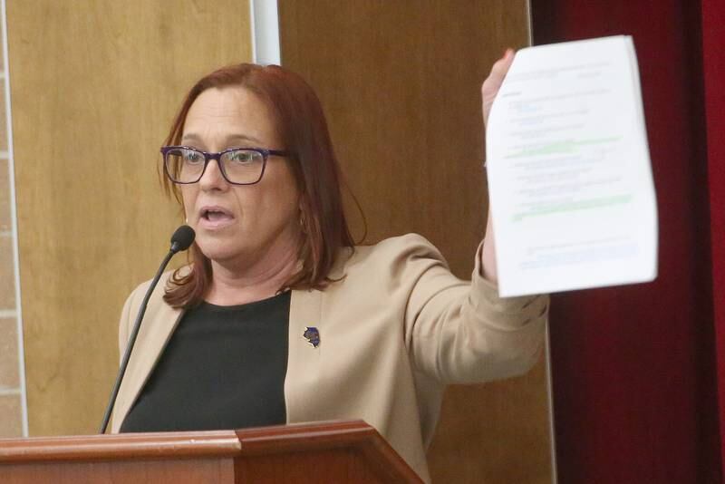 State Rep. Amy “Murri” Briel, D-Ottawa, speaks to the Illinois Health Facilities and Services Review Board during a public hearing regarding OSF St. Elizabeth Hospital's plans to reduce services on Tuesday, June 10, at Central Intermediate School in Ottawa.