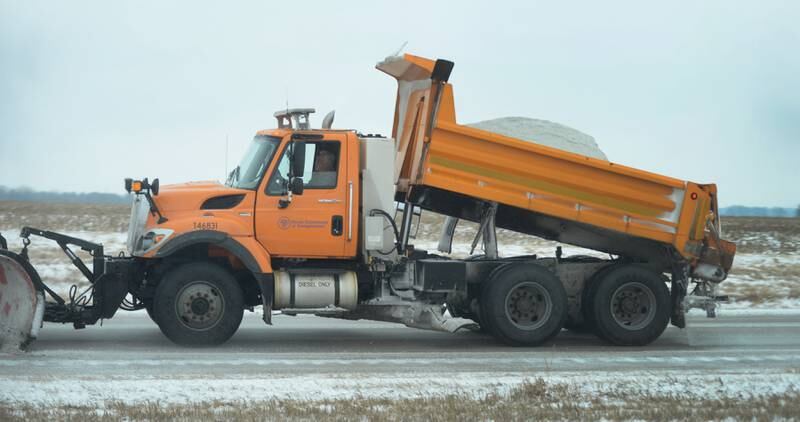 An Illinois Department of Transportation truck applies salt on Illinois 2 between Dixon and Sterling on Wednesday, Feb. 12, 2025.
