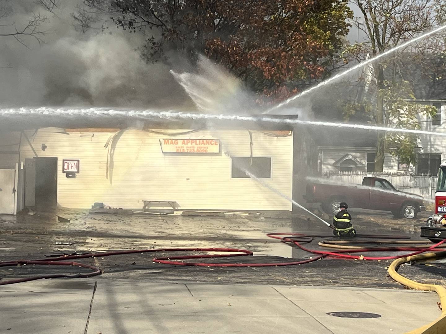 Joliet firefighters work to put out a fire at MAG Appliances, 1301 N. Broadway St., Joliet on Wednesday afternoon Oct. 30, 2024.