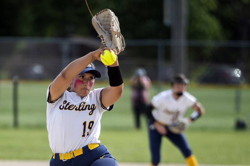 Sterling’s Lily Martinez winds up for a pitch against Rochelle Tuesday, May 27, 2025, during a Class 3A Regional softball game in Dixon.