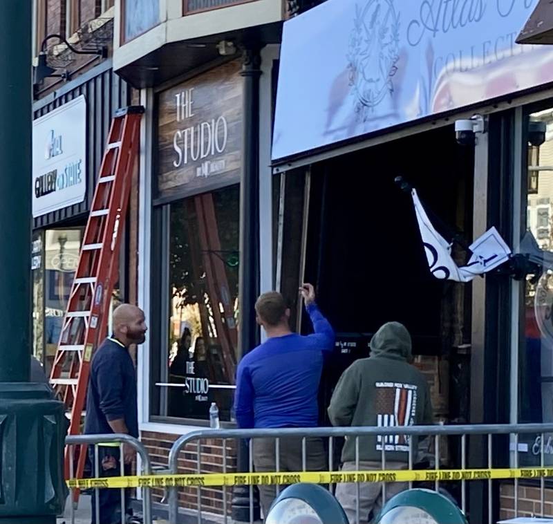 Authorities rope off an area on Friday, Oct. 24, 2025, in the 300 block of State Street in downtown Sycamore after a vehicle struck the front of Atlas Roots Collective clothing store. Police, fire and Sycamore city building officials were still cleaning the area as of about 3:15 p.m. Friday.