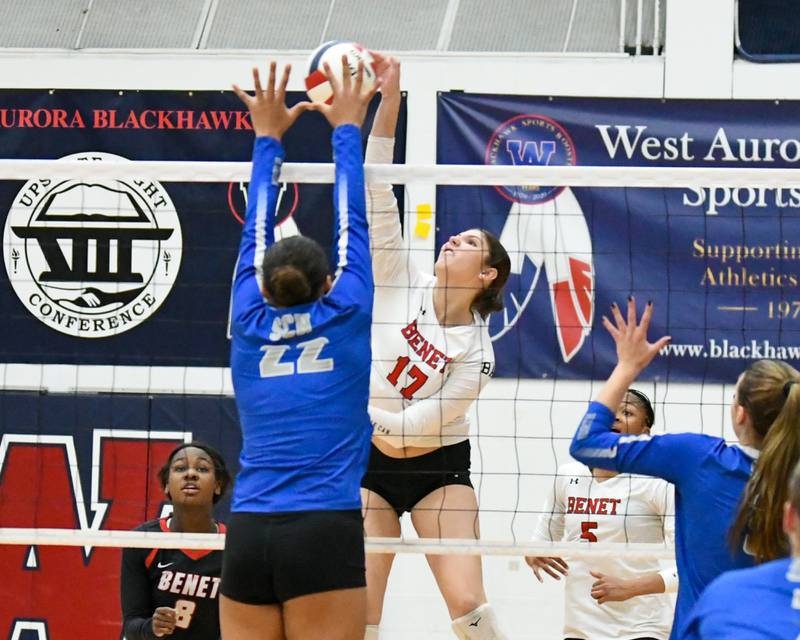 Benet Academy's Keira O'Donnell (17) spikes the ball past St. Charles North's Sidney Wright (22) during the 4A sectional championship game on Thursday Nov. 7, 2024, held at West Aurora High School.