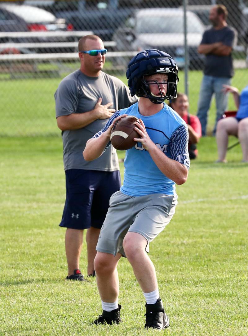 Bureau Valley sophomore quarterback Bryce Helms surveys the field to pass during Monday's 7 on 7 at Princeton.