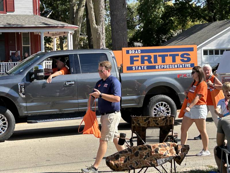 State Representative Brad Fritts (R-Dixon), shown giving out candy at Oregon's Harvest Day Parade on Oct. 5, is teaming up with the Regional Office of Education #47 for an upcoming winter clothes drive from Nov. 1-16.