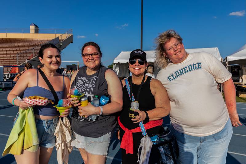 A group of “Locals” from all over the country Ashley Hall (CA), Amanda Olson (IA), Kelly McCormick (MO), and Melissa Salamah (TN) stop for a quick photo before seeing their favorite artist, Brett Eldredge perform at Taste of Joliet on June 21, 2025.