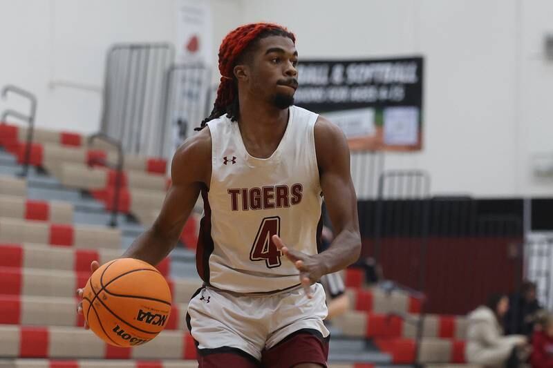 Plainfield North’s Amari Evans looks for a play against Naperville Central on Wednesday, Jan 22, 2025 in Plainfield.
