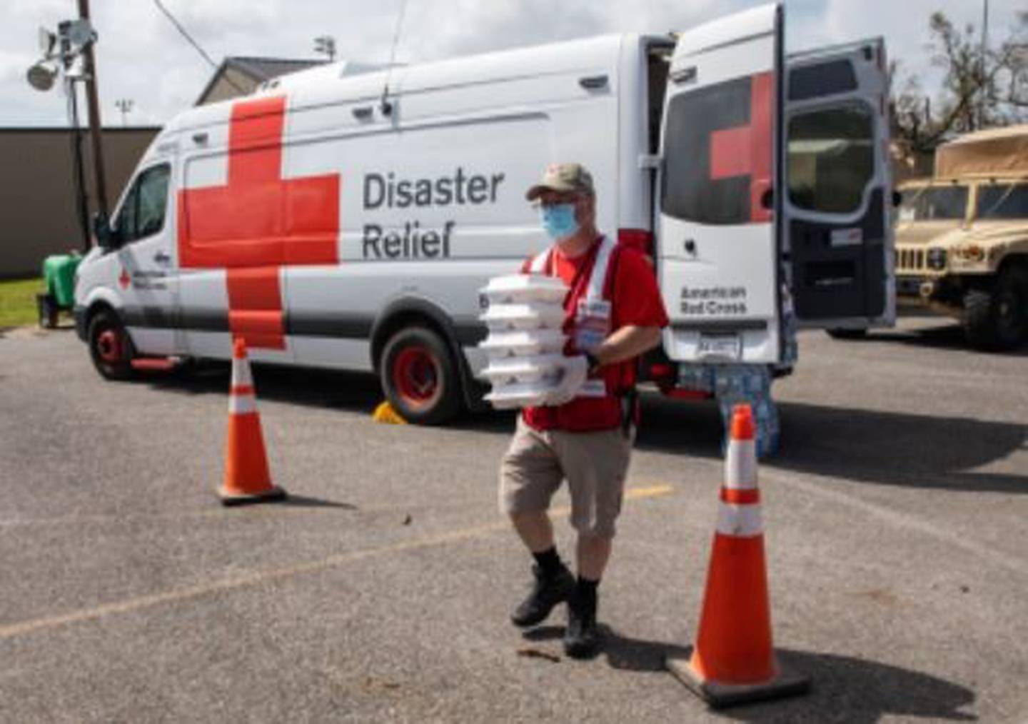 Brian McDaniel, executive director of the Romeoville-based American Red Cross Illinois River Valley chapter, is seen delivering meals to people impacted by Hurricane Laura.