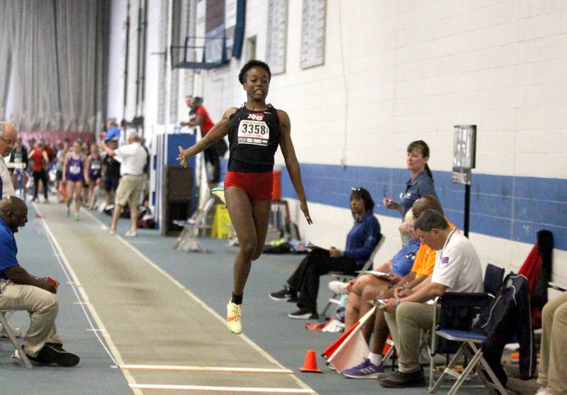 Huntley’s Alex Johnson competes in the 3A long jump finals during the IHSA Girls State Championships in Charleston on Saturday, May 21, 2022.