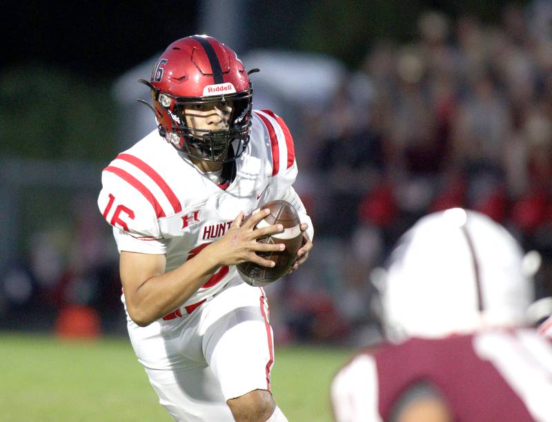 Huntley’s Braylon Bower looks for an option against Prairie Ridge in varsity football at Crystal Lake Friday night.