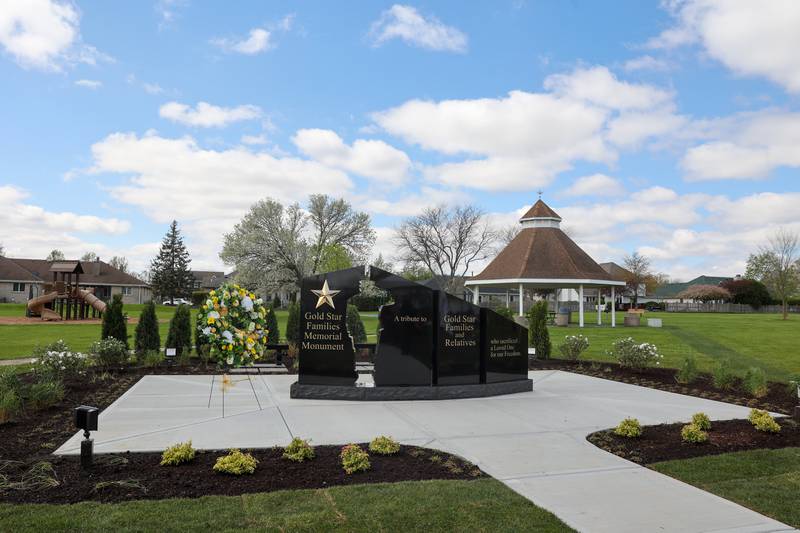 A dedication ceremony for the new Gold Star Families Memorial Monument at Marcotte Park in Bourbonnais was held on Saturday, April 26, 2025. The project was planned and fundraised for by 17-year-old Alexis McCullough, left, of Bourbonnais, for her Eagle Scout project in honor of her father, Col. Mark McCullough.