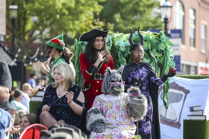 Plainfield Central High School Drama Club rides on a float in the Plainfield Homecoming parade Saturday, Sept 20, 2025.