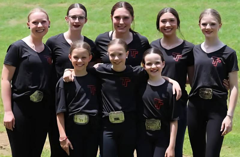 The 	Top Tier Equestrian team