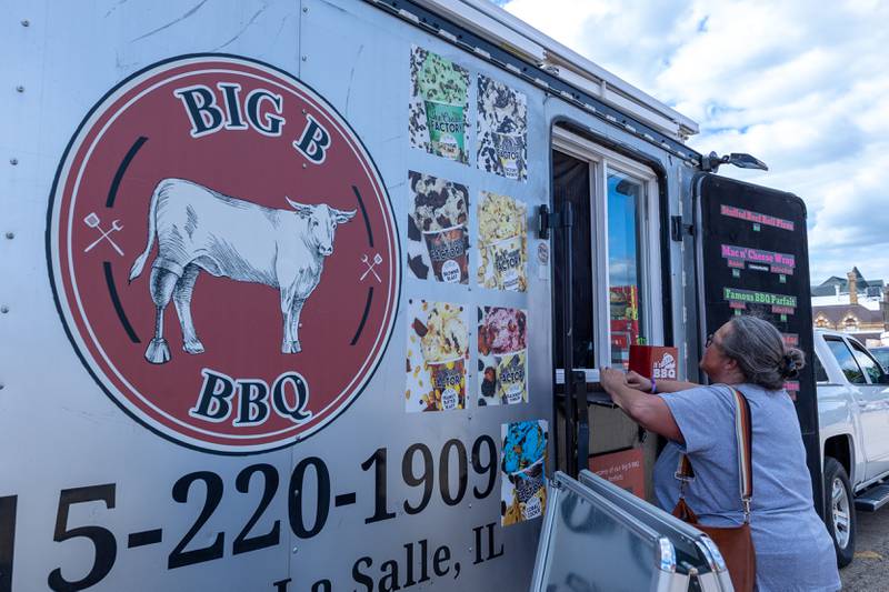 Customers retrieve order from Big B BBQ on Monday, Aug 25, 2025 on Illinois Avenue in Mendota.