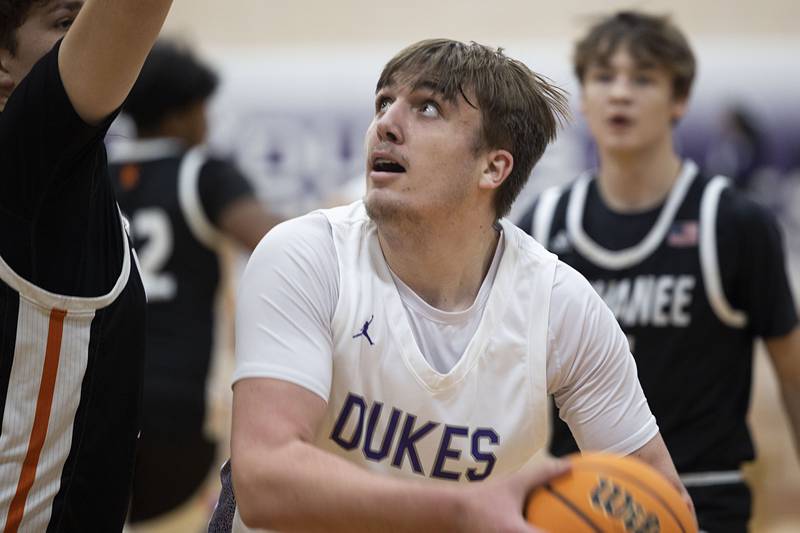 Dixon’s Jakob Nicklaus works below the basket against Kewanee Tuesday, Dec. 2, 2025.