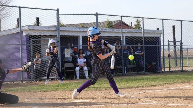 Rochelle's Emma Heller slaps a single during Monday's game with Rockford Lutheran.