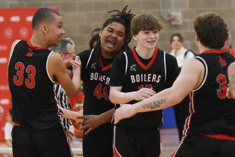 From left, Bradley-Bourbonnais' Anthony Boyce, Zyrie McCoffin, Carter Borneman and Calvin Kohl celebrate the Boilermakers' 43-34 win over Mt. Vernon in the IHSA Special Olympics Unified Basketball Division 1 State championship Saturday, March 15, 2025 at the University of Illinois Activities and Recreation Center.