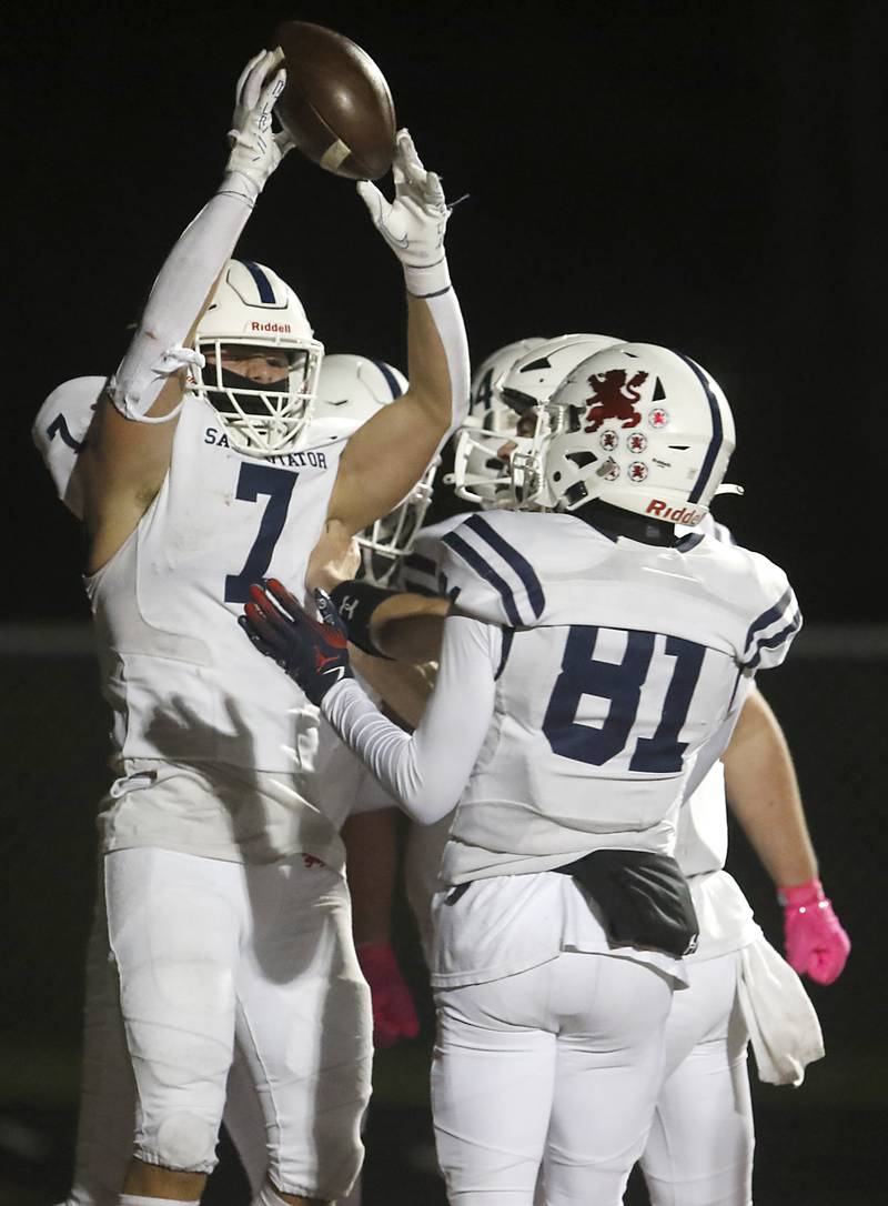 St. Viator's Michael Tauscher celebrates his touchdown during a IHSA Class 4A first round playoff football game against Richmond-Burton Friday, Oct. 27, 2023, at Richmond-Burton High School in Richmond.