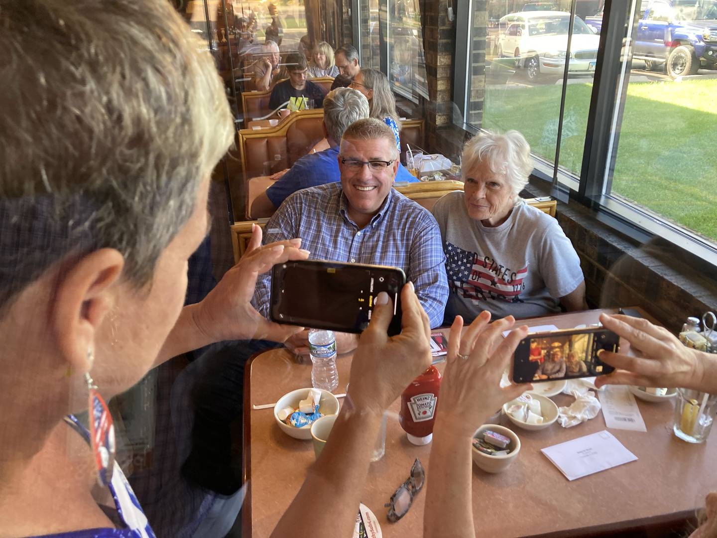 Republican candidate for governor, Darren Bailey, meets with potential voters Wednesday, Sept. 21, 2022, at Around the Clock Restaurant in Crystal Lake.