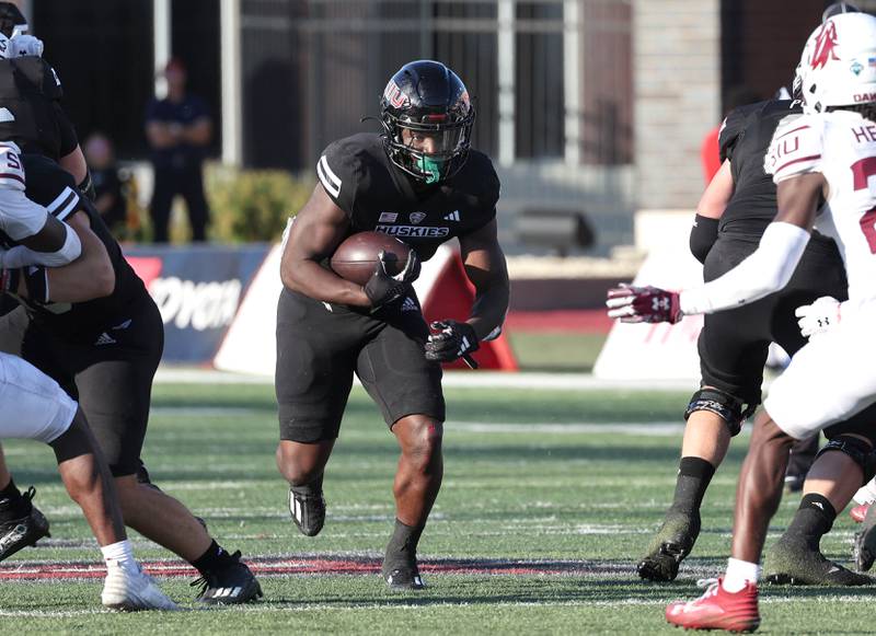 Northern Illinois' Ontario Brown finds a hole in the Southern Illinois defense late in their game Saturday, Sept. 9, 2023, in Huskie Stadium at NIU in DeKalb.