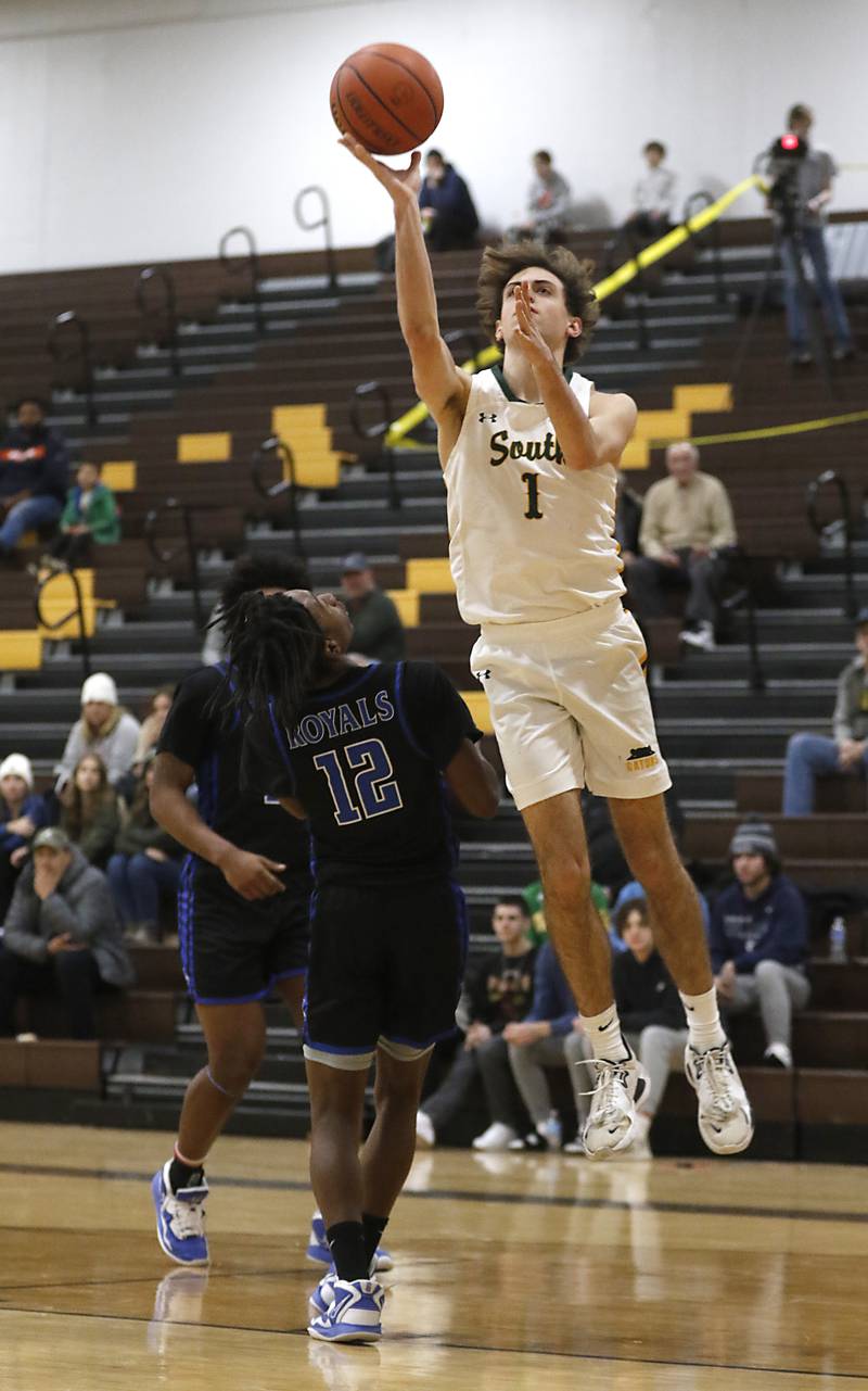 Crystal Lake South's Zachary Peltz drives to the basket against Larkin’s Andre Jones during a Hinkle Holiday Classic basketball game Wednesday, Dec. 28, 2022, at Jacobs High School in Algonquin.