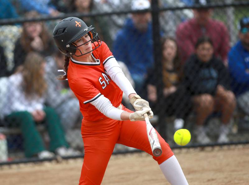 St. Charles East's Holly Smith hits the ball during a game against St. Charles North on Friday, April 25, 2025 at St. Charles North.