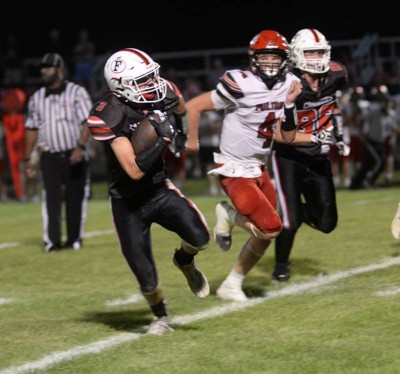 Forreston's Alex Ryia (3) runs for a big gain against Fulton during on Friday, Aug. 25, 2023.