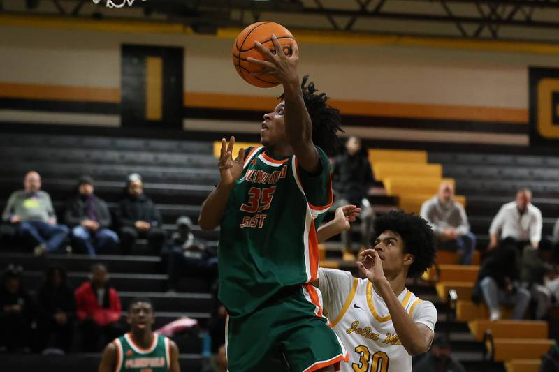 Plainfield East’s Alijah Little goes in for the basket against Joliet West on Friday, Dec. 19, 2025 in Joliet.