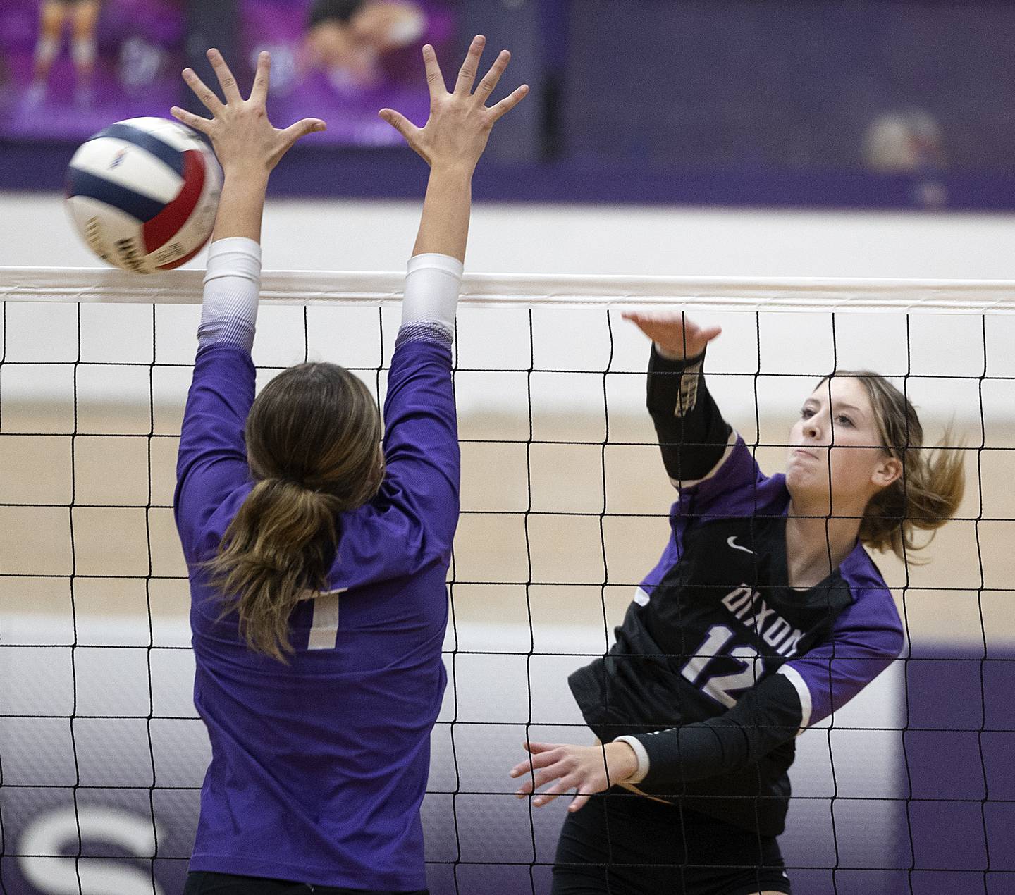 Dixon’s Isabelle Quackboerner spikes the ball against Rochelle Monday, Oct. 28, 2024, during regional play in Dixon.