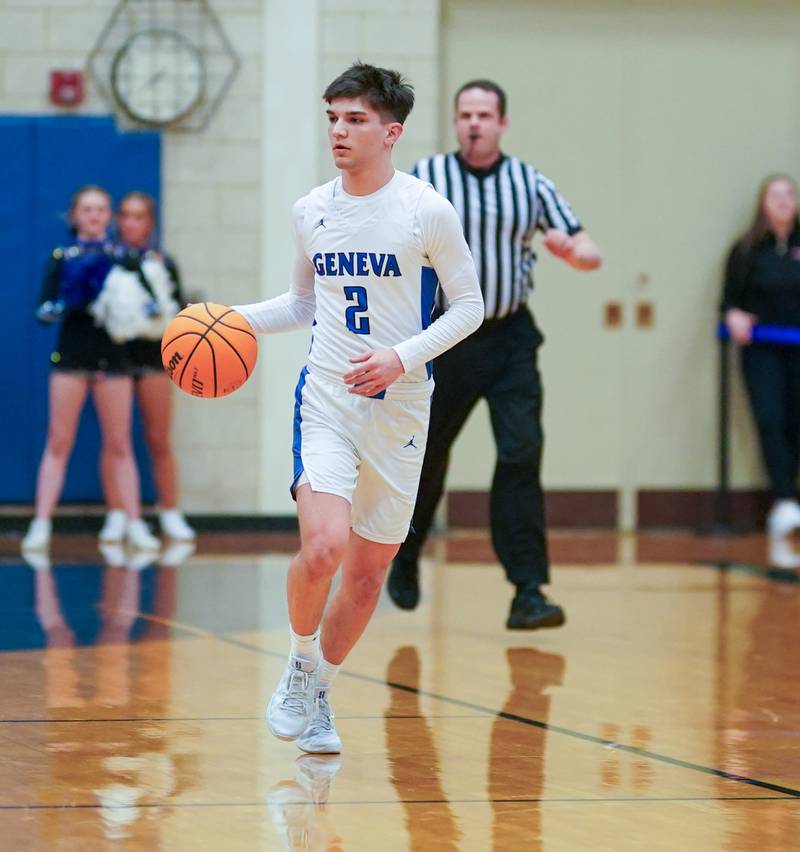 Geneva’s Gabe Jensen (2) brings the ball up the court against Batavia during a basketball game at Geneva High School on Friday, Feb. 7, 2025.