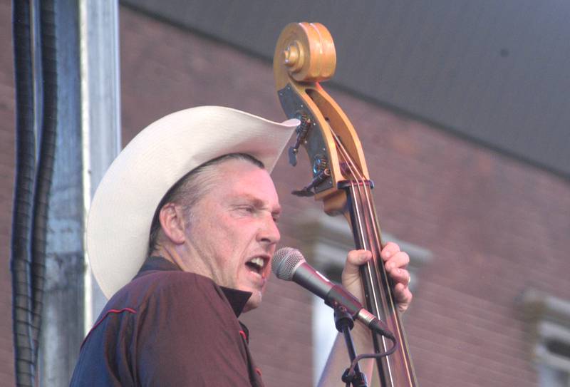 Scott Hinds of The Royal Hounds plays to the crowd during George Fest in downtown Rock Falls on Saturday, July 26, 2025.