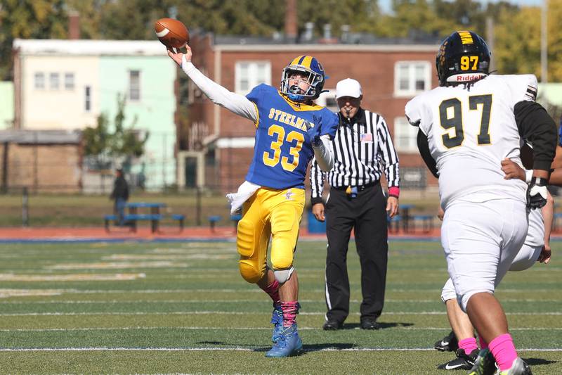 Joliet Central’s Paul Slick passes against Joliet West in the cross town rival matchup on Saturday.